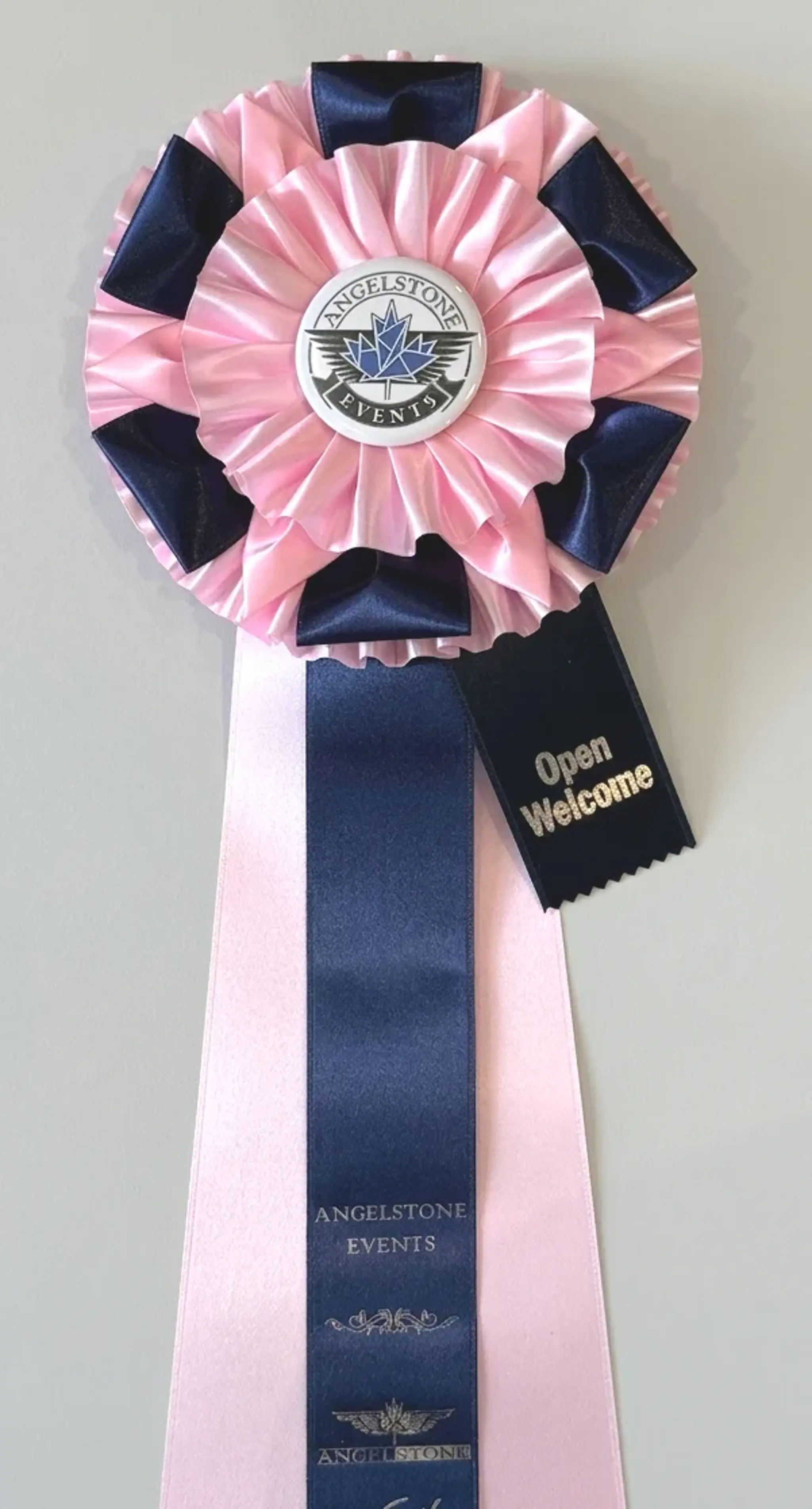 Pink Grand Prix rosette award ribbon