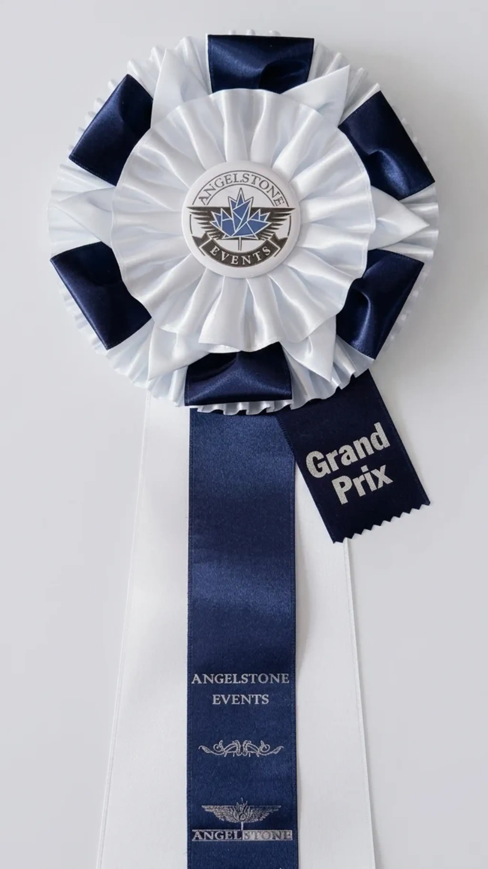 White Grand Prix rosette award ribbon
