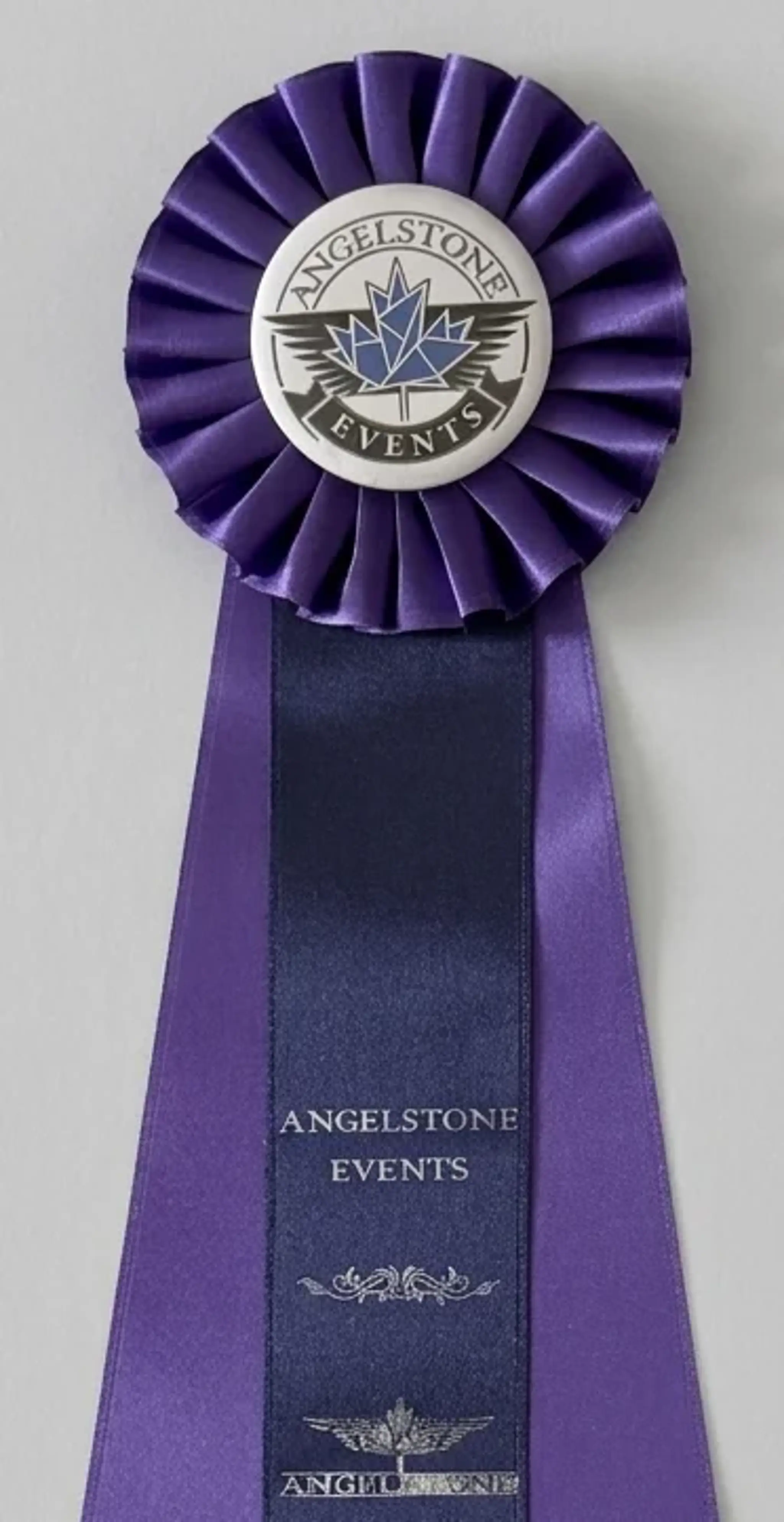 Purple award ribbon for competitions and events